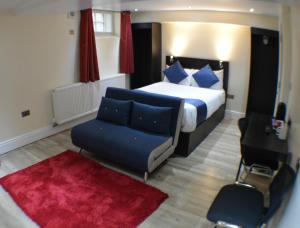 Postel nebo postele na pokoji v ubytování Ville Hotel