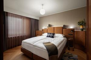 Łóżko lub łóżka w pokoju w obiekcie Reykjavik Natura - Berjaya Iceland Hotels