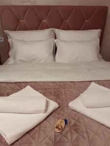 Postel nebo postele na pokoji v ubytování Apartman Planinski Kutak