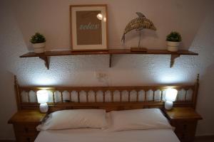 A bed or beds in a room at Anacasa Marineta Bot PB2103