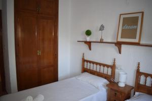 A bed or beds in a room at Anacasa Marineta Bot PB2103