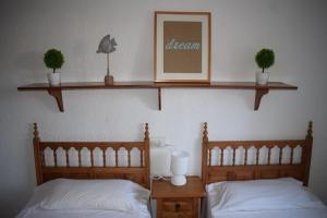 A bed or beds in a room at Anacasa Marineta Bot PB2103