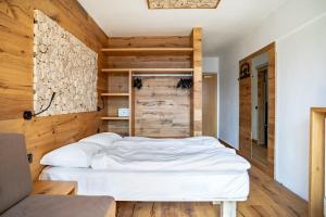 Voodi või voodid majutusasutuse Hotel Cristiania toas