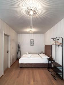 Postel nebo postele na pokoji v ubytování easy flat Hyrtlgasse
