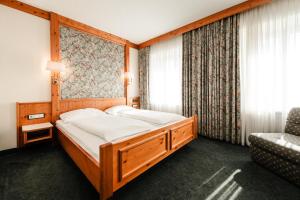 Postel nebo postele na pokoji v ubytování Hotel & Restaurant Ochsen Merklingen