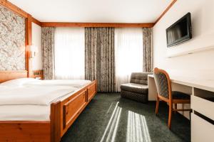 Postel nebo postele na pokoji v ubytování Hotel & Restaurant Ochsen Merklingen