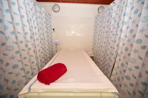 Postel nebo postele na pokoji v ubytování Hotel Paris