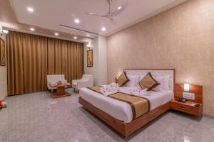 Voodi või voodid majutusasutuse Savitri Resort toas