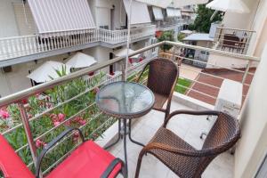 A balcony or terrace at Christina Hotel