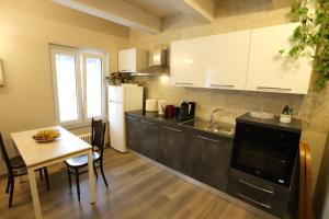 Kuchyň nebo kuchyňský kout v ubytování B&B 18 Gradini