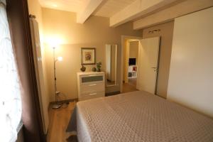 Postel nebo postele na pokoji v ubytování B&B 18 Gradini