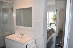A bathroom at Spacious Apartment in Tarragona + Pool