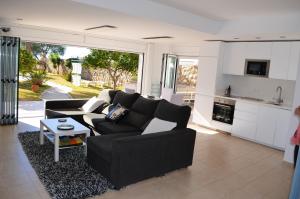 A kitchen or kitchenette at Spacious Apartment in Tarragona + Pool