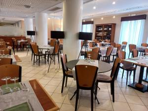 Posezení v ubytování UNA HOTELS Occhiobello