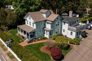 an aerial view of a house with a yard at Westbrook Inn Bed and Breakfast in Westbrook