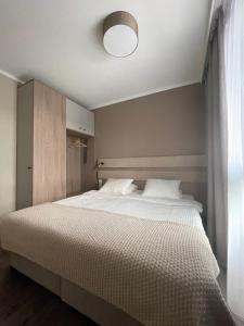 Giường trong phòng chung tại Bel Mare