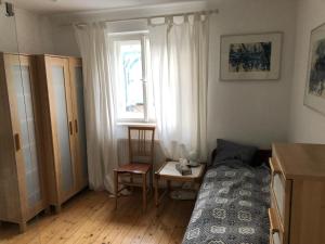 Postel nebo postele na pokoji v ubytování Haus mit Sauna und privatem Badeteich in Anif bei Salzburg + 37 fotografií