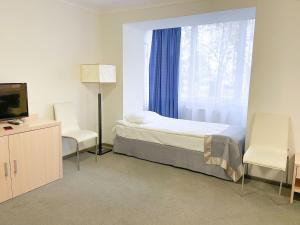 Posteľ alebo postele v izbe v ubytovaní Atlantica (ex-Optima) Sevastopol