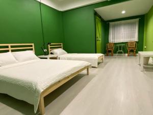 Grasshopper Bed and Cafe客房内的一张或多张床位