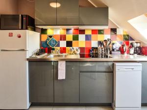 Kjøkken eller kjøkkenkrok på Cosy'Appart - LE GERVAIS