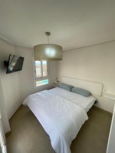 Posteľ alebo postele v izbe v ubytovaní Adosado obra nueva residencial de lujo