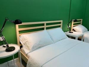 Grasshopper Bed and Cafe客房内的一张或多张床位