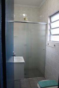 Ванная комната в Pousada Flor de Aurora Bertioga