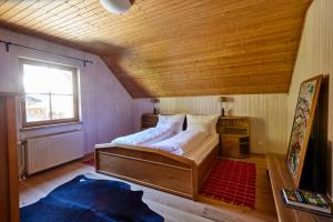 Posteľ alebo postele v izbe v ubytovaní Frein Chalets - Wildalm