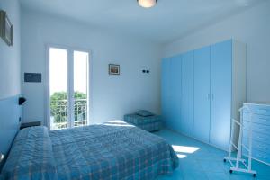 Een bed of bedden in een kamer bij Residence Cielo e Mare