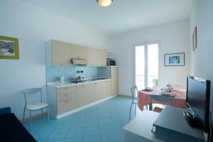 Een keuken of kitchenette bij Residence Cielo e Mare