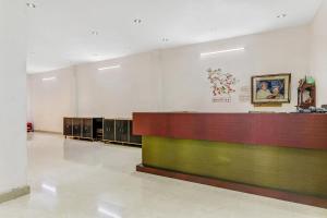 a large room with a cash counter in a building at Hotel K V PALACE in Varanasi