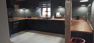 Kuchyňa alebo kuchynka v ubytovaní Czech Lodge