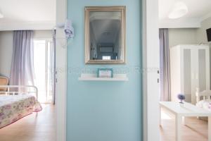 Posteľ alebo postele v izbe v ubytovaní Vasileiadou Coastal Rooms
