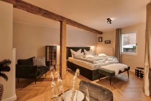 Ein Bett oder Betten in einem Zimmer der Unterkunft Loft 1540 - Boutique Ferienwohnungen