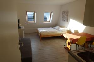 Postel nebo postele na pokoji v ubytování Apartments Kaninska Vas