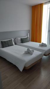 Een bed of bedden in een kamer bij Centre Esplai Albergue