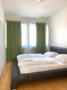 Letto o letti in una camera di Graf-Adolflux