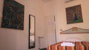 Postel nebo postele na pokoji v ubytování Casa ParticulART