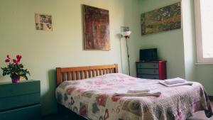 Postel nebo postele na pokoji v ubytování Casa ParticulART