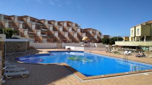 The swimming pool at or close to Nice sea views at Torviscas beach 1 Bedr. Orlando
