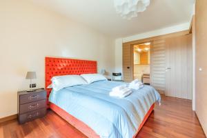 Posteľ alebo postele v izbe v ubytovaní Terrazza su Sestriere Lux