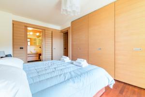 Posteľ alebo postele v izbe v ubytovaní Terrazza su Sestriere Lux