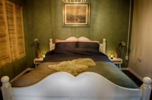 Katil atau katil-katil dalam bilik di Guesthouse Valkenswaard