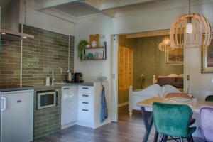 Dapur atau dapur kecil di Guesthouse Valkenswaard