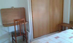 Łóżko lub łóżka w pokoju w obiekcie Hostal Casa Maria