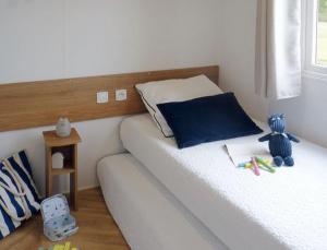 Postel nebo postele na pokoji v ubytování Évasion Lodge