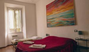 Postel nebo postele na pokoji v ubytování Casa ParticulART