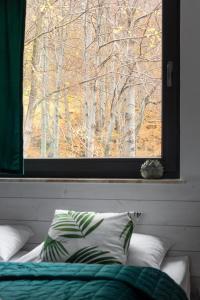 Posteľ alebo postele v izbe v ubytovaní APARTAMENT SKANDYNAWSKI 2-poziomowy SAUNA JACUZZI