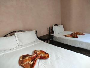 Postel nebo postele na pokoji v ubytování Hotel Zagora