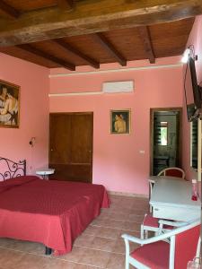 Postel nebo postele na pokoji v ubytování Agriturismo Montefosco